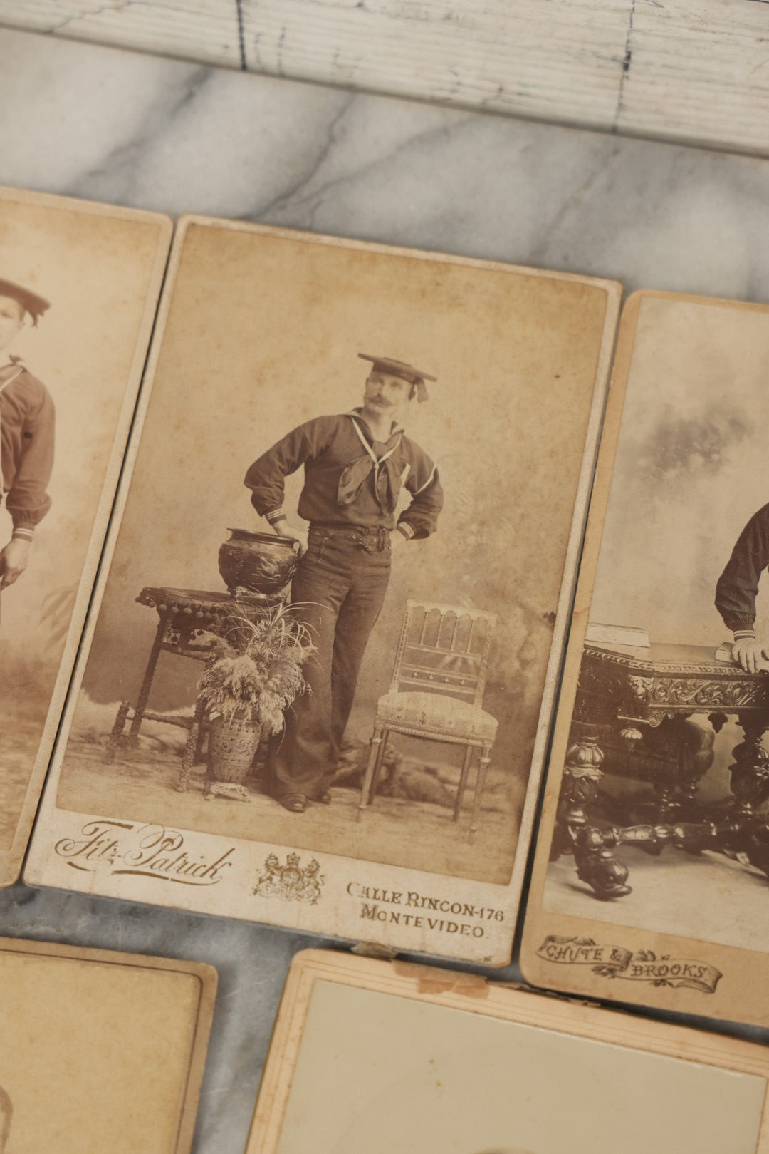 Lot 002 - Grouping Of Sixteen Antique Cabinet Card Photographs Of United States Navy Sailors Of The U.S.s Newark, Circa 1880, Photos Taken In Montevideo, Uruguay, South America