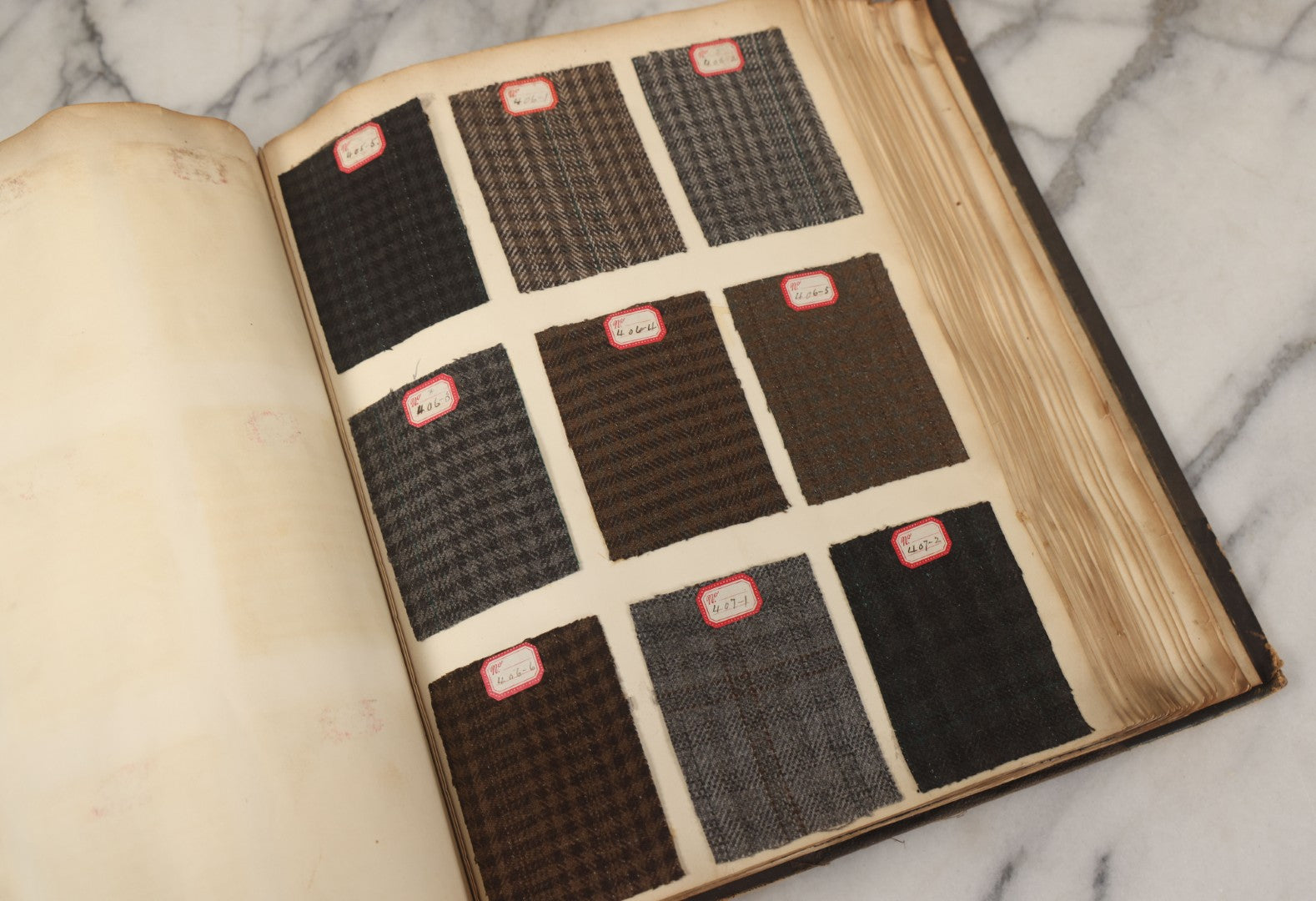 Lot 007 - Antique Sample Fabric Wool Swatch Book From Stearns & Beale Manufacturers, New York City, Styles No. 8675-9606, Containing Dozens Of Fabric Samples