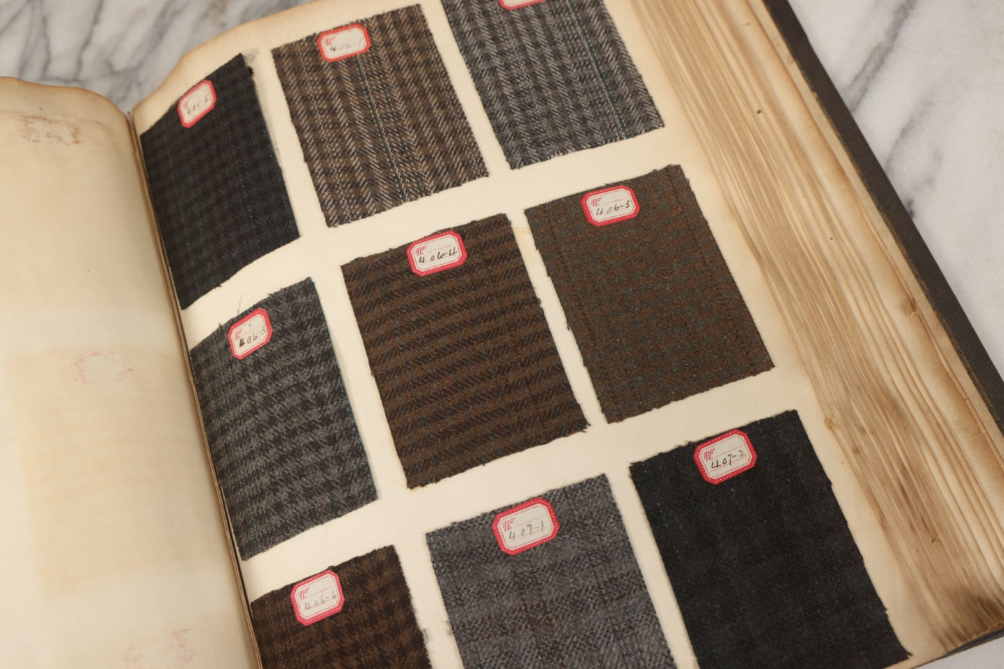 Lot 007 - Antique Sample Fabric Wool Swatch Book From Stearns & Beale Manufacturers, New York City, Styles No. 8675-9606, Containing Dozens Of Fabric Samples