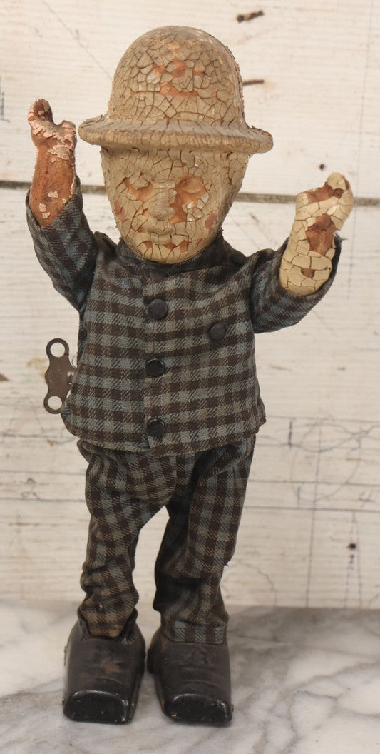 Lot 036 - Vintage Composition Wind-Up Walker Doll In Bowler Hat, By Waterbury Clock Co., Non Working, With Severe Deterioration, Paint Loss