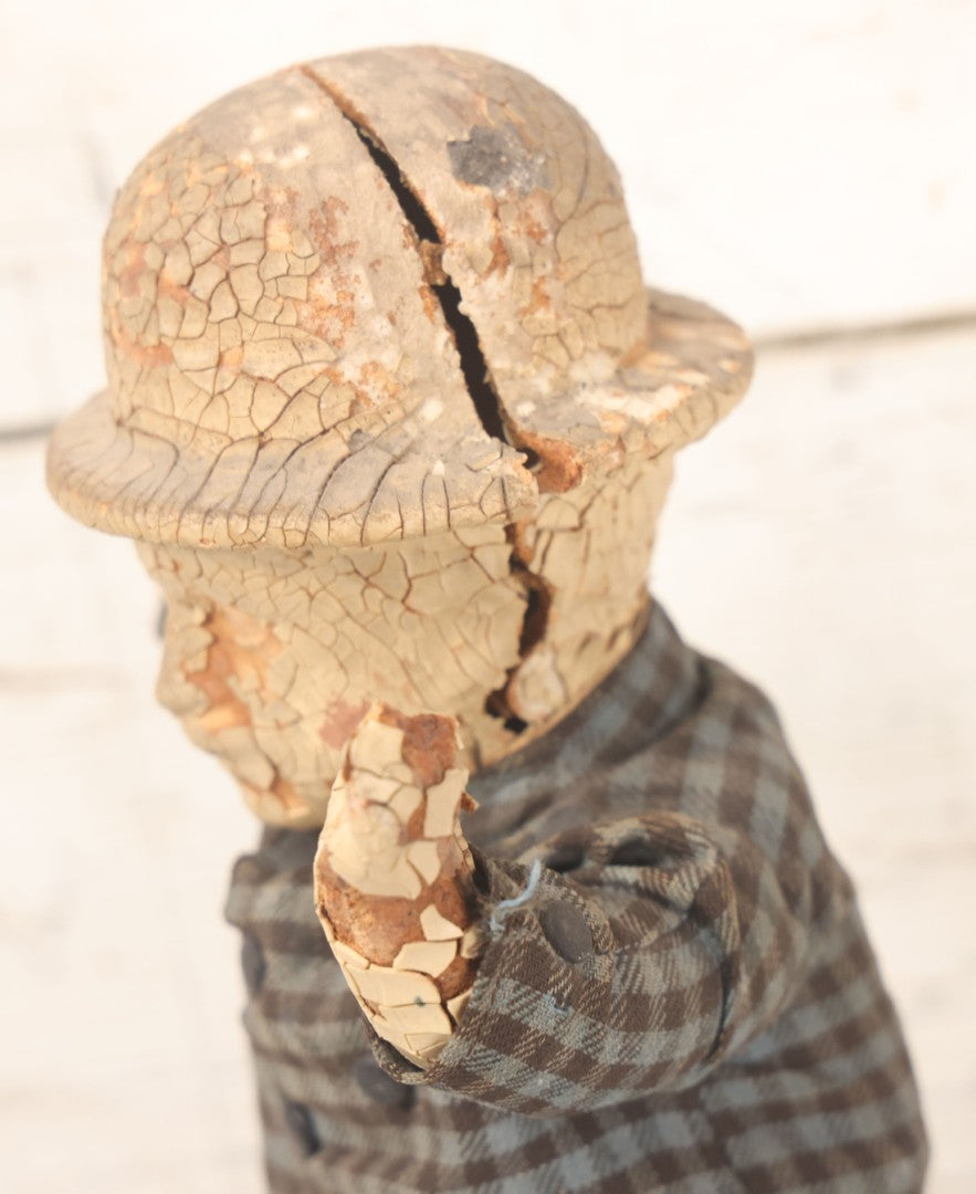 Lot 036 - Vintage Composition Wind-Up Walker Doll In Bowler Hat, By Waterbury Clock Co., Non Working, With Severe Deterioration, Paint Loss