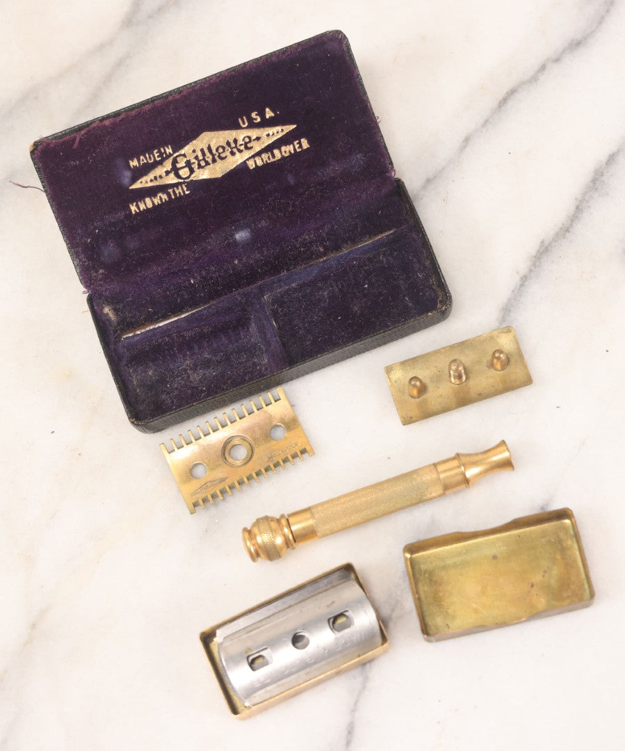 Lot 045 - Antique Brass Gillette Razor, Complete With Original Parts, Blades, In Purple Velvet Lined Carrying Case