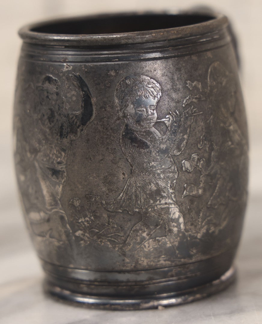 Lot 052 - Antique Silverplate Cup With Dancing Children, Playing Instruments Motif, By Meriden Silver Plate Company, Quadruple Plated, No. 889