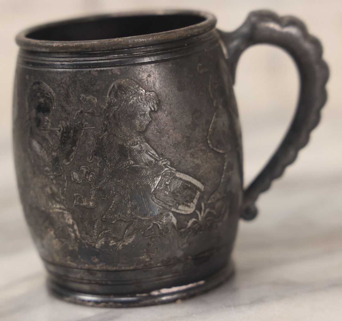 Lot 052 - Antique Silverplate Cup With Dancing Children, Playing Instruments Motif, By Meriden Silver Plate Company, Quadruple Plated, No. 889