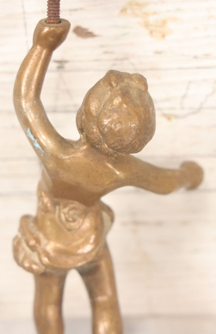 Lot 055 - Antique Cast Brass Cherub Baby Lamp Fragment, With Threaded Hole In Foot, And Threaded Knob On Top, As Found