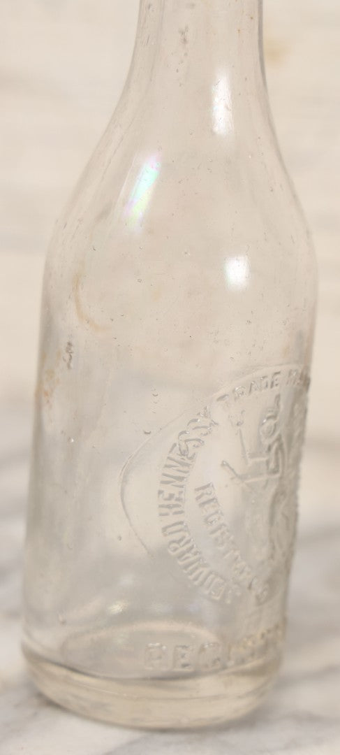 Lot 059 - Antique J. Edward Hennessy Glass Bottle, Salem, Massachusetts, With Flying Witch Logo