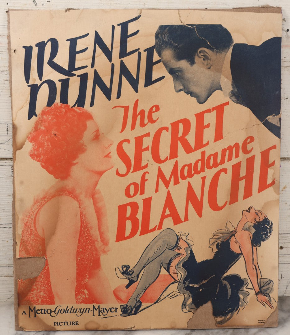 Lot 062 - Vintage Movie Poster Advertisement For Irene Dunne In "The Secret Of Madame Blanche" (1933) A Metro-Goldwyn-Mayer Picture, Affixed To Cardboard Backing, Note Losses, Wear, Tears