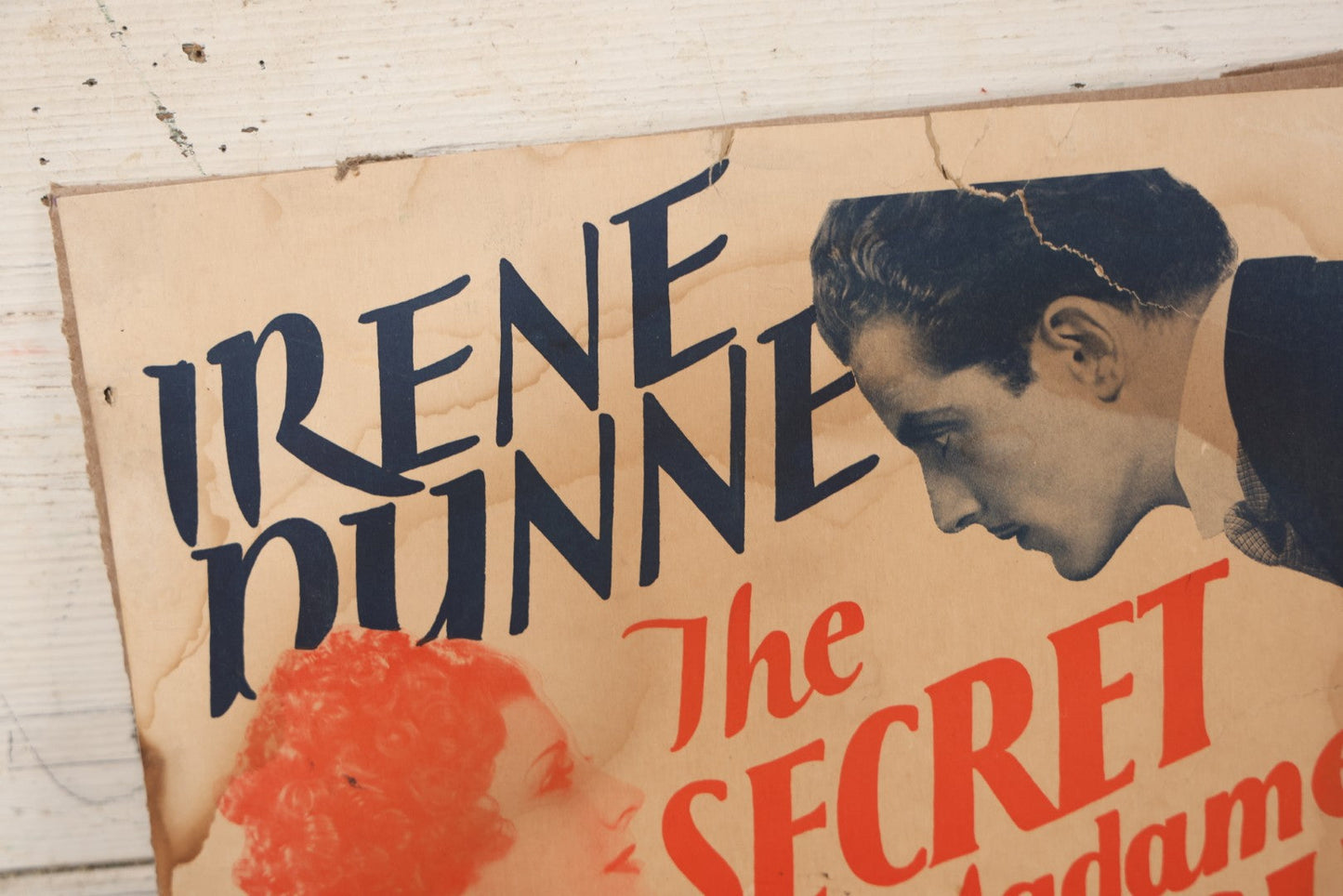 Lot 062 - Vintage Movie Poster Advertisement For Irene Dunne In "The Secret Of Madame Blanche" (1933) A Metro-Goldwyn-Mayer Picture, Affixed To Cardboard Backing, Note Losses, Wear, Tears