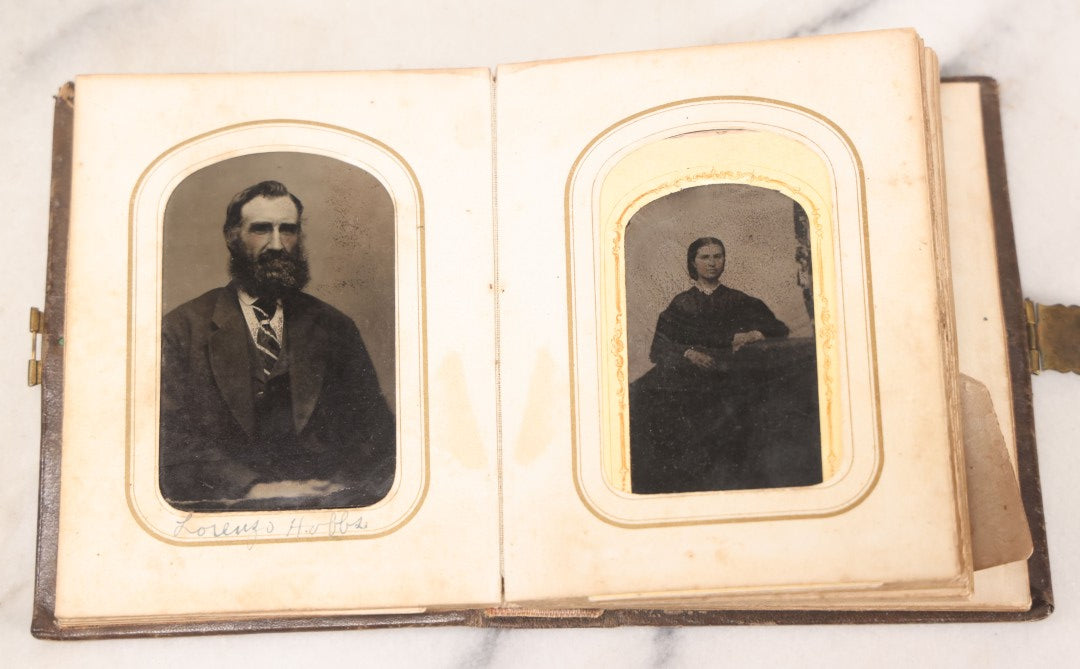 Lot 064 - Antique Family Photo Album Containing 16 Tintypes And 7 Carte De Visite C.D.V. Photographs, Mostly Portraits Of The Pratt And Hobbs Families, Many Identified, Mostly Full 