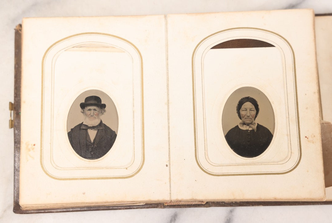 Lot 064 - Antique Family Photo Album Containing 16 Tintypes And 7 Carte De Visite C.D.V. Photographs, Mostly Portraits Of The Pratt And Hobbs Families, Many Identified, Mostly Full 