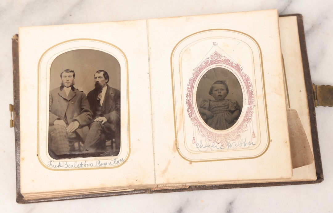 Lot 064 - Antique Family Photo Album Containing 16 Tintypes And 7 Carte De Visite C.D.V. Photographs, Mostly Portraits Of The Pratt And Hobbs Families, Many Identified, Mostly Full 