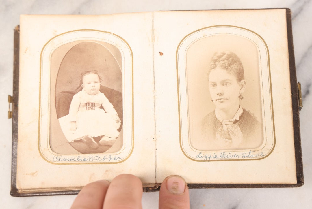 Lot 064 - Antique Family Photo Album Containing 16 Tintypes And 7 Carte De Visite C.D.V. Photographs, Mostly Portraits Of The Pratt And Hobbs Families, Many Identified, Mostly Full 