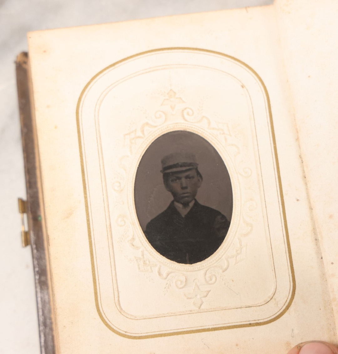 Lot 064 - Antique Family Photo Album Containing 16 Tintypes And 7 Carte De Visite C.D.V. Photographs, Mostly Portraits Of The Pratt And Hobbs Families, Many Identified, Mostly Full 