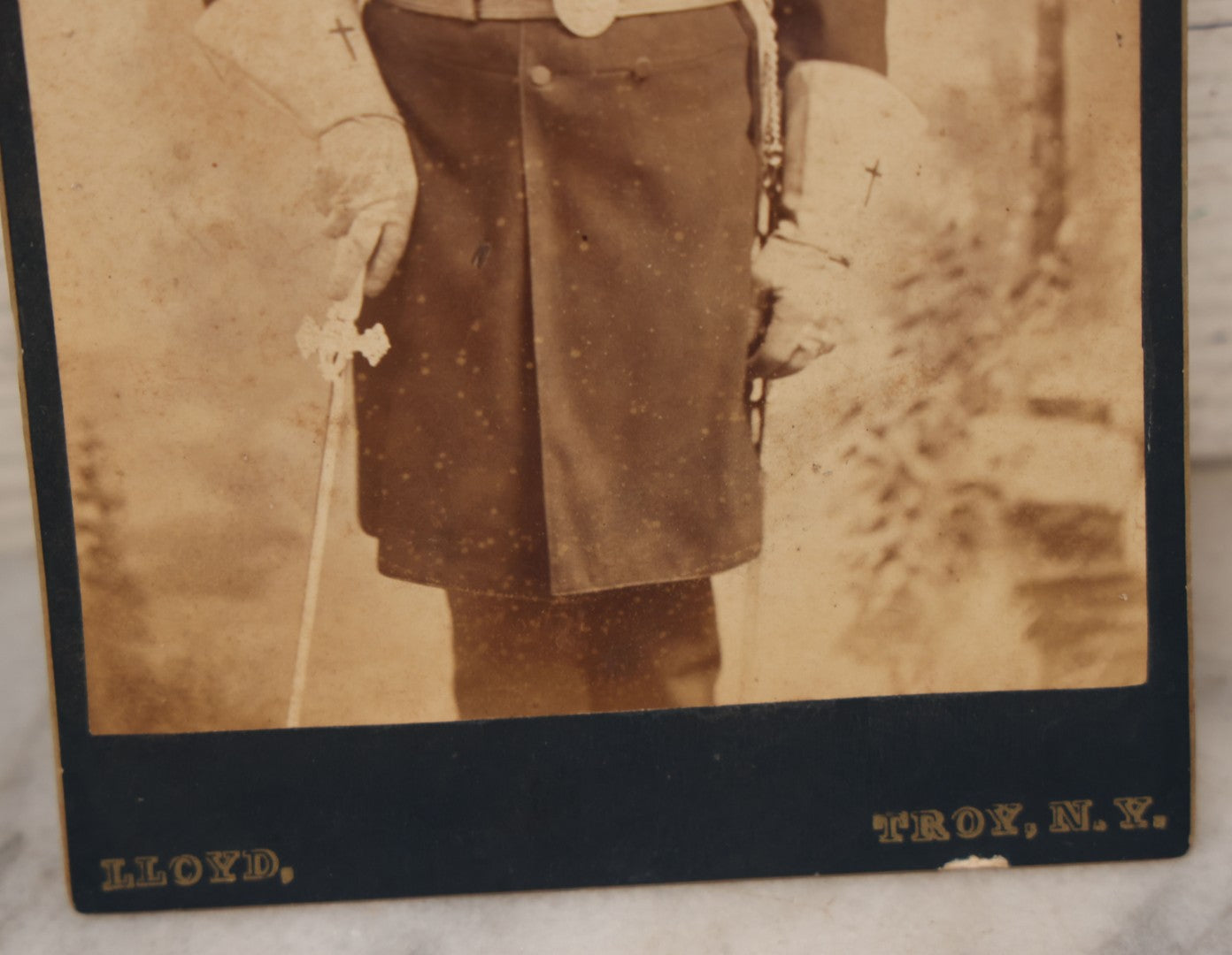 Lot 068 - Antique Cabinet Card Photograph Of An Adult Man In Freemason / Knights Templar Uniform With Sash, Sword, Belt, And Gloves, Featuring Red Cross Insignia, Etc., Lloyd Photographer, Troy, New York