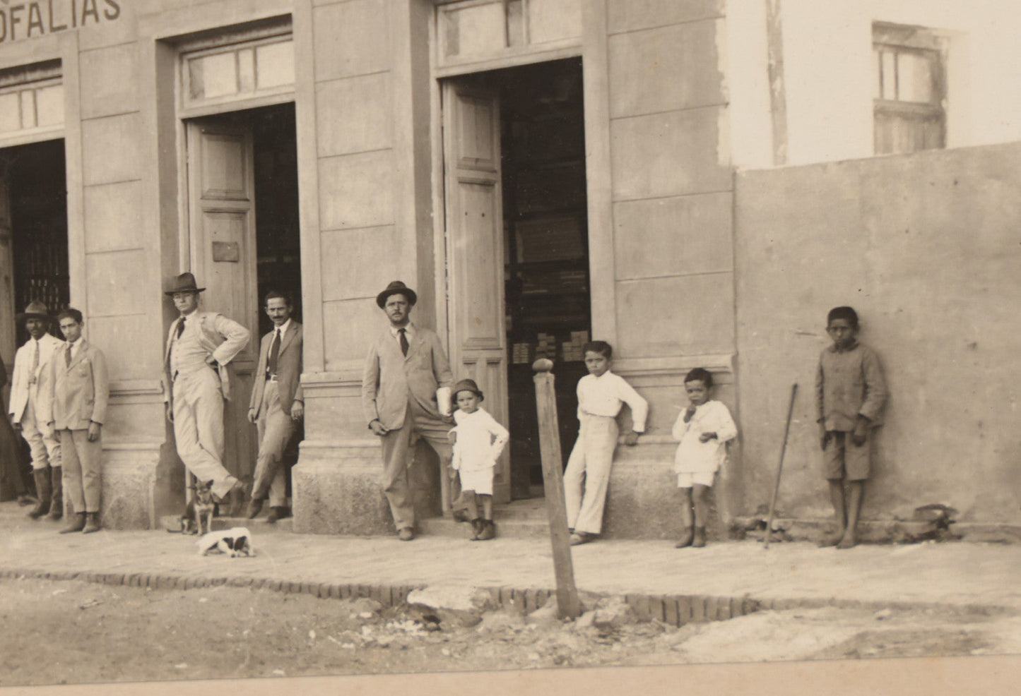 Lot 070 - Antique Mexican Or South American Boarded Photograph Of A General Store Or Like Establishment, Casa Comercial, Sarapiqui & Garofalías, With Two Dogs In Photo