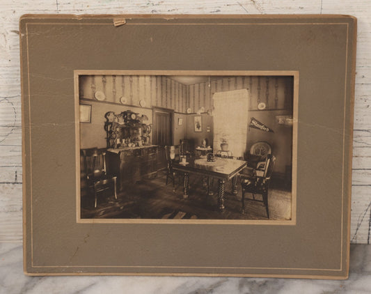 Lot 073 - Antique Boarded Interior Photograph Of A Dining Room With Period Furniture, Stanford University Pennant, Information On Verso, Stamp From Camera Store, Durango, Colorado