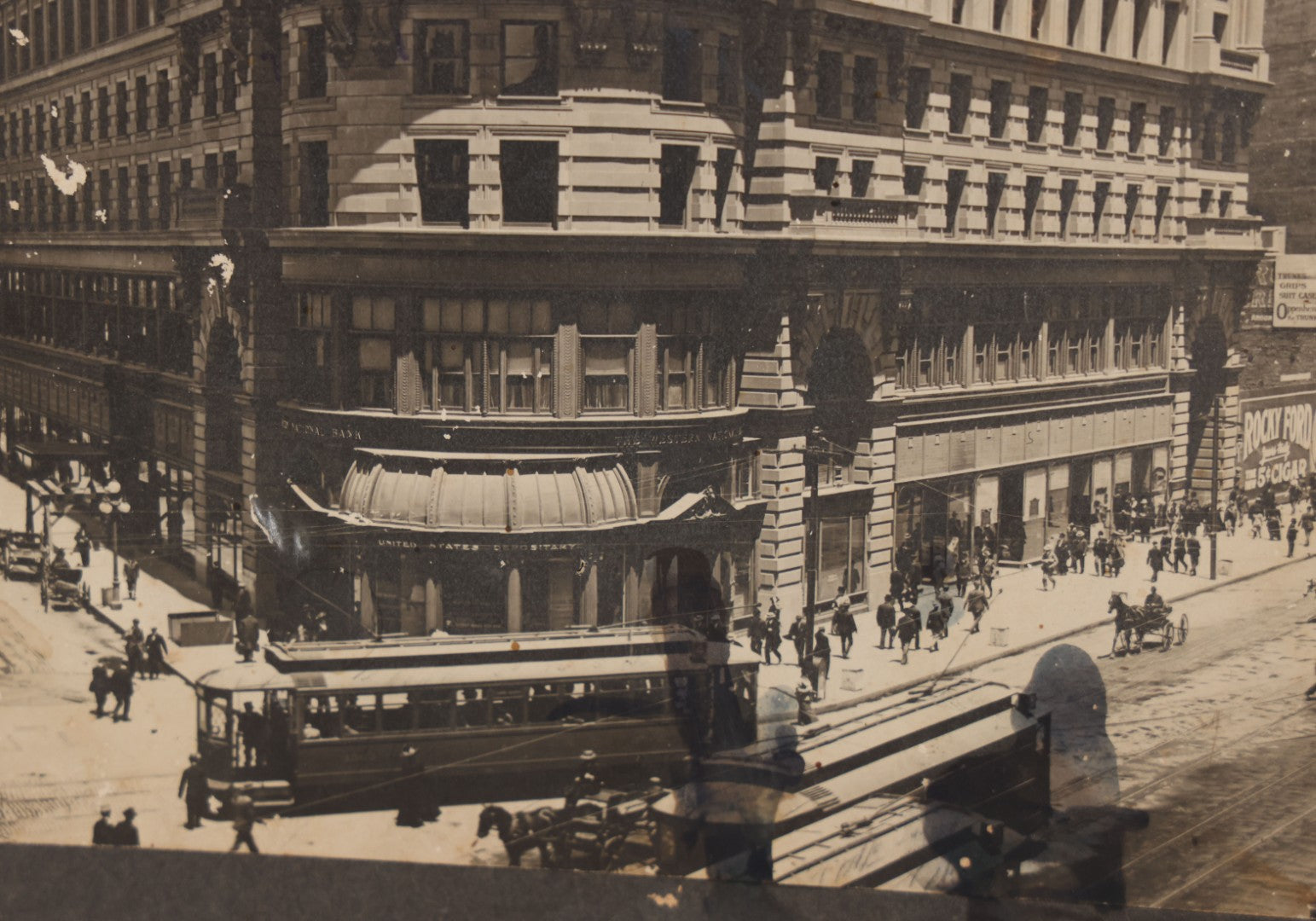 Lot 075 - Antique Boarded Photograph Of The Flood Building, San Francisco, California, Circa 1900, With Trolley Car In Photo, United States Depository, Note Wear, Handwriting On Verso