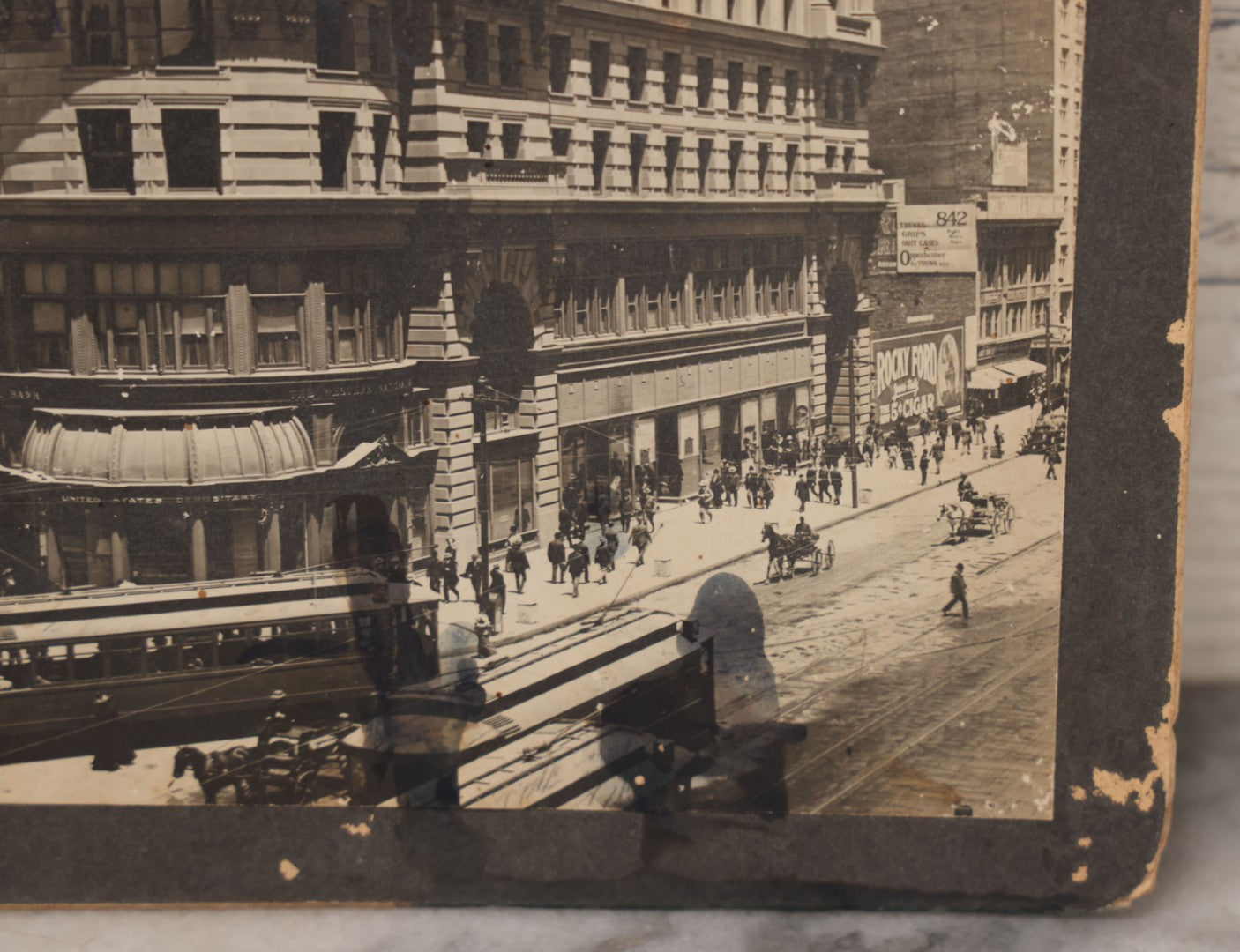 Lot 075 - Antique Boarded Photograph Of The Flood Building, San Francisco, California, Circa 1900, With Trolley Car In Photo, United States Depository, Note Wear, Handwriting On Verso