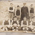 Lot 078 - Antique Real Photo Postcard R.P.P.C. Of An All-Star Men's Basketball Team, 1915-1916 Season, Seven Players With Coach, Unused