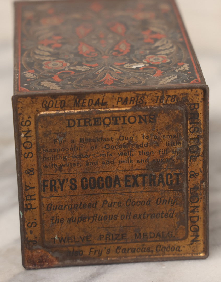 Lot 094 - Three Piece Vintage And Antique Tin Lot Including J.S. Fry And Co. Coca Tin-Turned-Pepper-Tin, Cake Tin, And Flour Tin