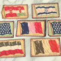 Lot 141 - Grouping Of Seven Antique Tobacco Felt Country Flags Including The United States Jack, France, Austria Hungary, Zion, Belgium, Germany, And France