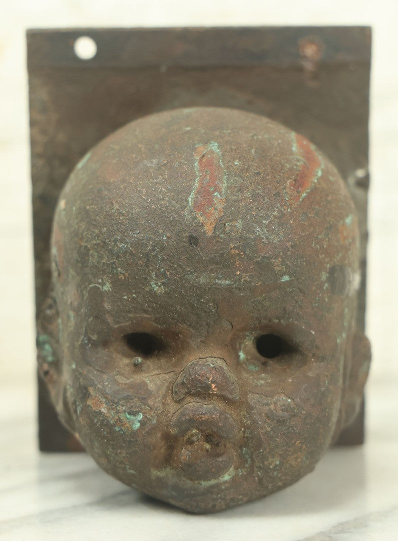 Lot 020 - Vintage Cast Metal Doll Head Mold, Circa 20th Century, As Found