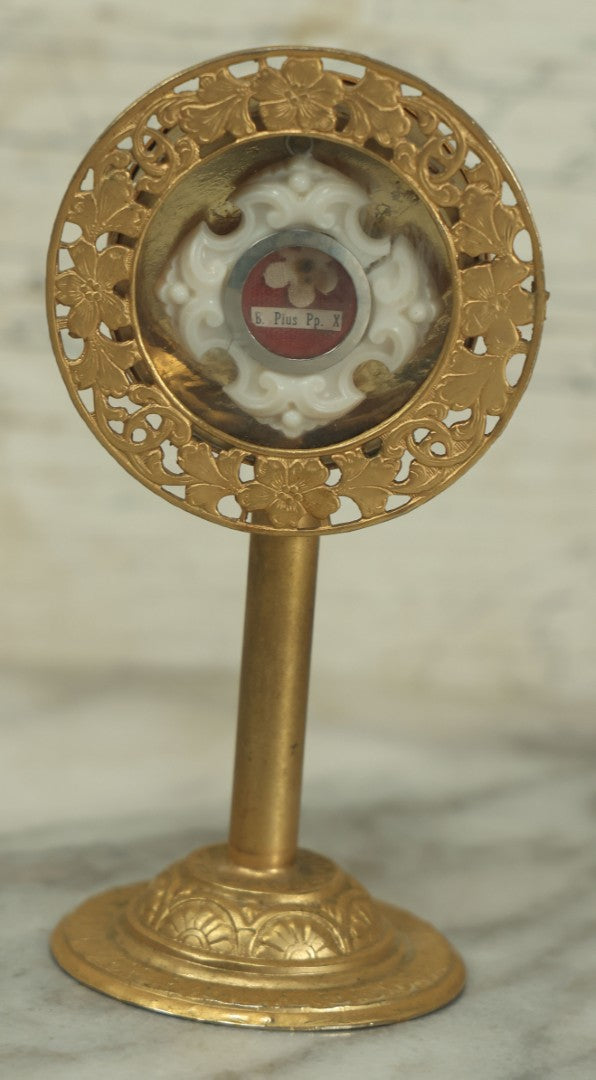 Lot 022 - Vintage Catholic Religious Relic In Brass Stand Of Pope Pius X,  Note Crack In White Plastic Housing, As Found