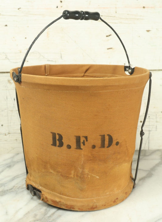 Lot 025 - Antique Brookfield Fire Department B.F.D. Canvas Folding Water Bucket, By Handy Folding Pail Co., Westfield, Massachusetts