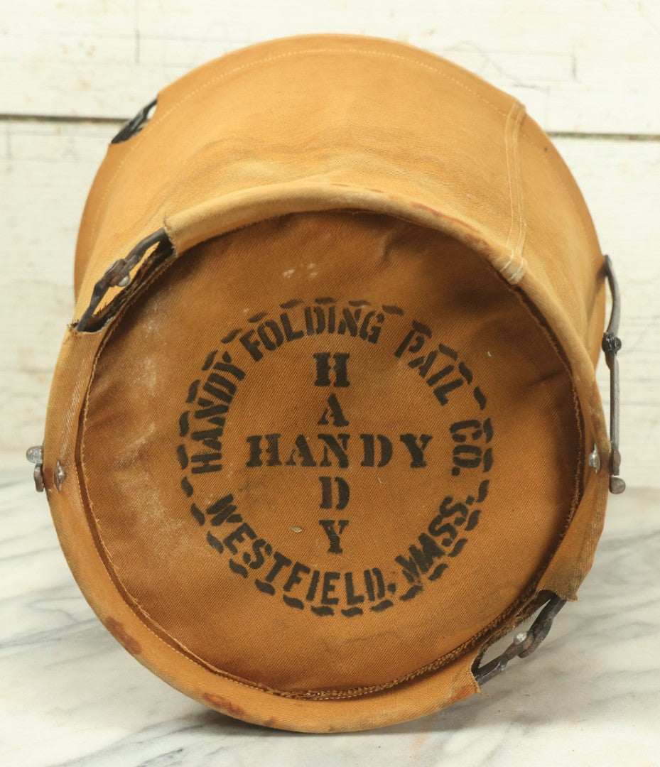 Lot 025 - Antique Brookfield Fire Department B.F.D. Canvas Folding Water Bucket, By Handy Folding Pail Co., Westfield, Massachusetts