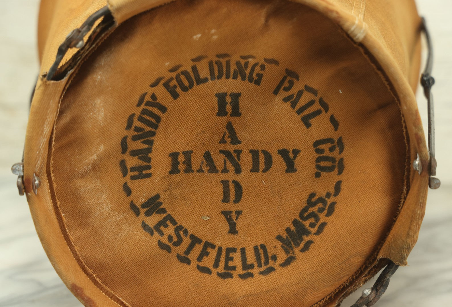 Lot 025 - Antique Brookfield Fire Department B.F.D. Canvas Folding Water Bucket, By Handy Folding Pail Co., Westfield, Massachusetts