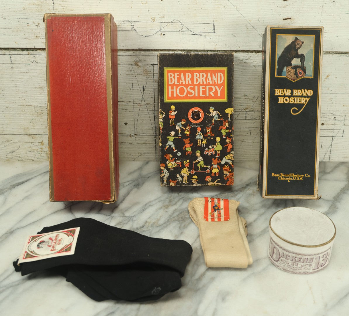 Lot 034 - Grouping Of Hosiery And Advertising Boxes Including Bear Brand Boxes With Contents, Other Brands, Stocks And Stockings, As Found, Including Collar Box, One Lot One Money