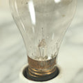 Lot 056 - Antique New Type Edison Lamp Light Bulb, Latest Patent Date September 1882, On Simple Porcelain Fixture, As Found, Untested, With Paper Label