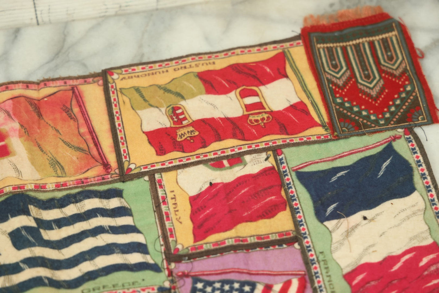 Lot 062 - Antique Tobacco Felt Sewn Quilt With Flags From Many Countries Including The United States, Austria Hungary, Poland, Italy, France, Russie, Etc, As Found