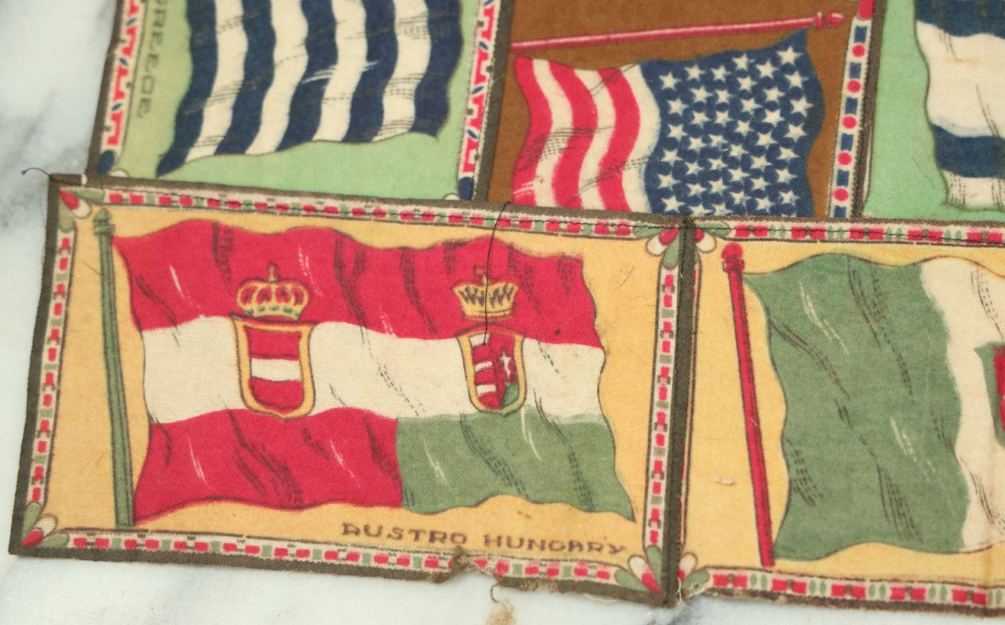 Lot 062 - Antique Tobacco Felt Sewn Quilt With Flags From Many Countries Including The United States, Austria Hungary, Poland, Italy, France, Russie, Etc, As Found