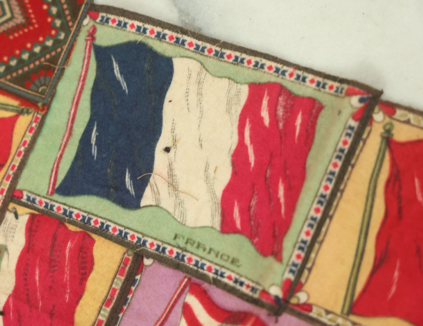 Lot 062 - Antique Tobacco Felt Sewn Quilt With Flags From Many Countries Including The United States, Austria Hungary, Poland, Italy, France, Russie, Etc, As Found