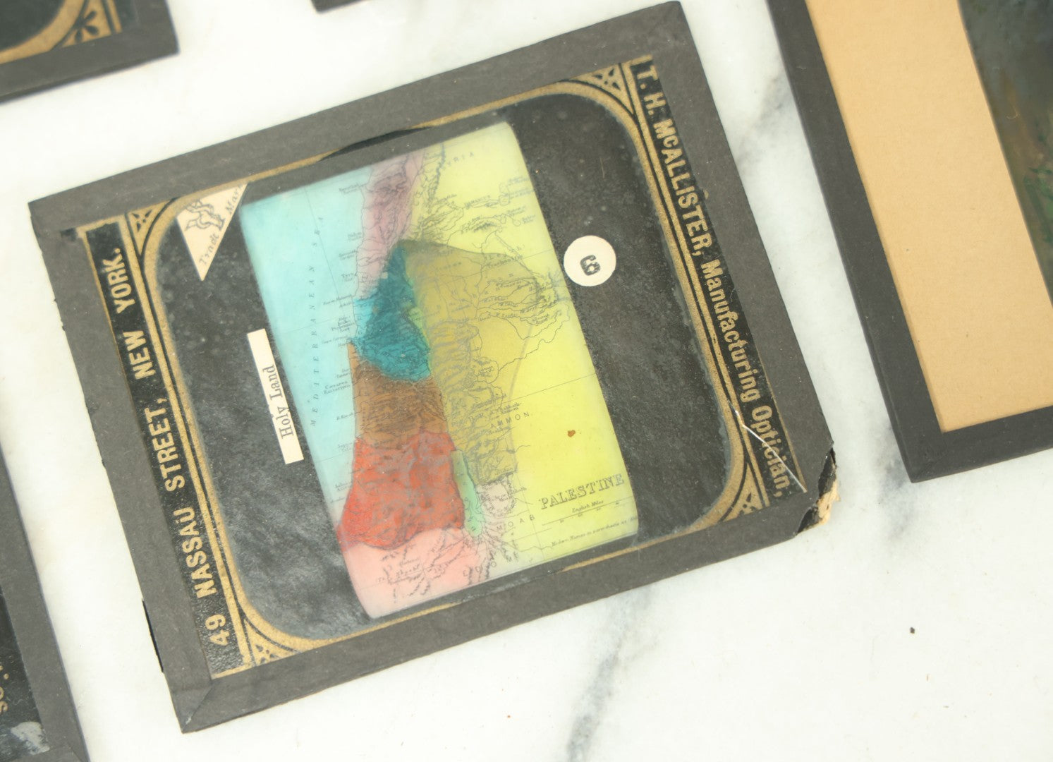 Lot 074 - Grouping Of Eleven Antique Hand Colored And Other Magic Lantern Slides Depicting Religious Scenes, Botany, Maps, Landmarks, And Other Subjects