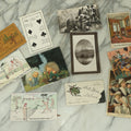 Lot 089 - Grouping Of Eleven Vintage And Antique Postcards And Trade Cards, Including Trade Card With Insect, Orphan Girls, Illustrated Nudist Comic Postcards, And More
