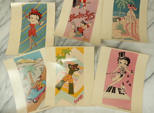 Lot 090 - Grouping Of Six Vintage Glossy Photos Of Cartoon Artwork Including Betty Boop, Pink Panther, Flintstones, And Gumby, 1980s, Hanna-Barbera, Fleischer Studios, Etc.