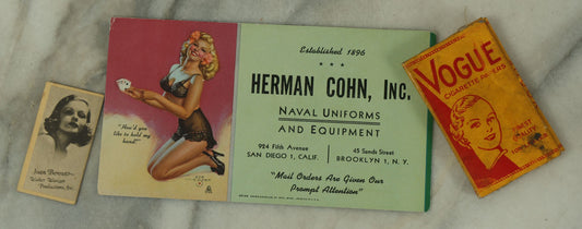 Lot 109 - Three Piece Ephemera Grouping Including Pinup Blotter For Herman Cohn, Inc Naval Uniforms, Vogue Cigarette Papers, And Joan Bennett Movie Star Card