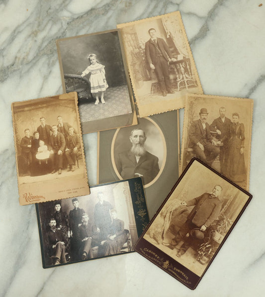 Lot 114 - Grouping Of Seven Assorted Cabinet Card Photographs Of Men, Children, And Families, Photographers From New York, New Jersey, Etc.