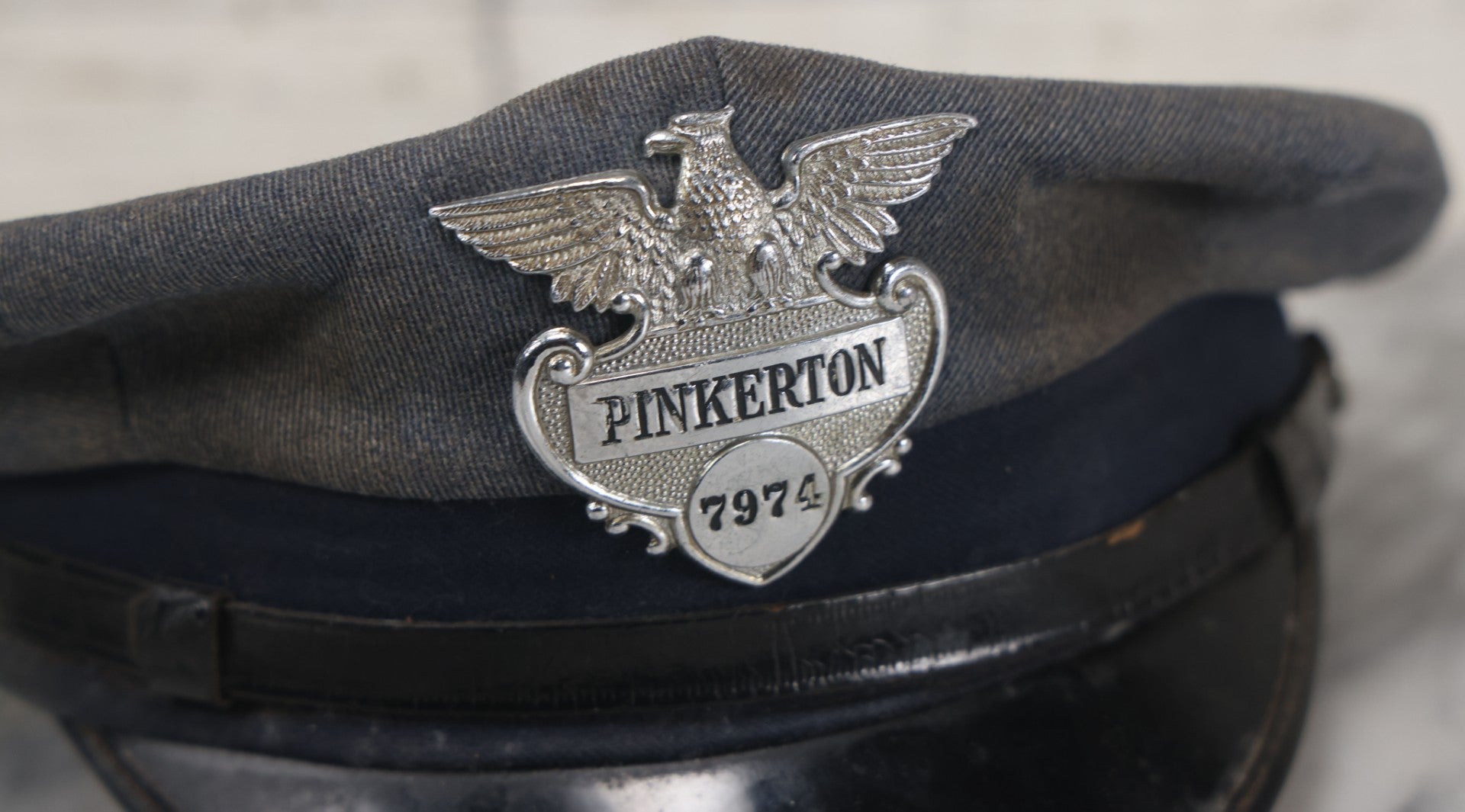 Lot 018 - Vintage Pinkerton Security Officer's Hat With Eagle Badge No. 7974, Pinkerton Buttons, Size 7-3/8"