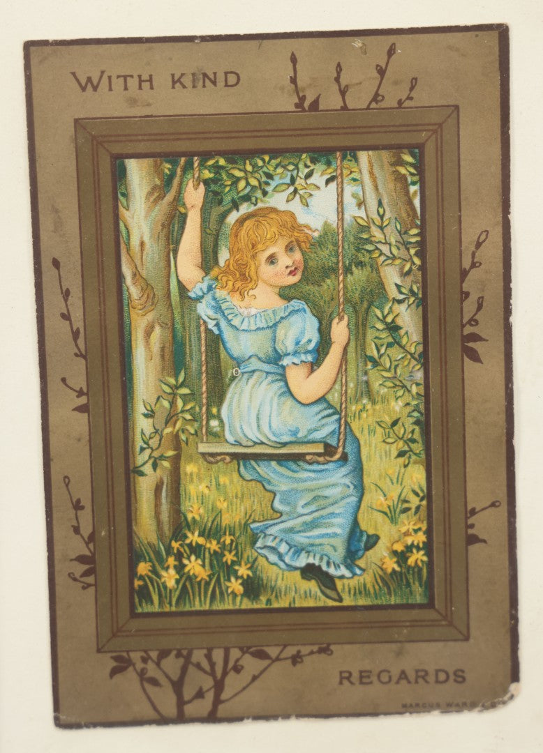 Lot 057 - Antique Framed Postcard Of A Little Girl In Blue On A Swing "With Kind Regards," By Marcus Ward & Co., 5-3/4" x 7-3/4"