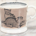 Lot 059 - Antique Transferware Ceramic Mug With Cats And Dogs, Geometric Pattern On Interior