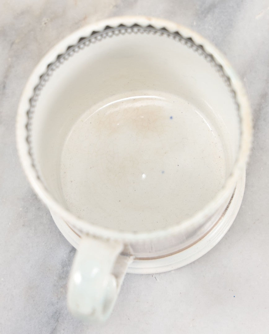 Lot 059 - Antique Transferware Ceramic Mug With Cats And Dogs, Geometric Pattern On Interior