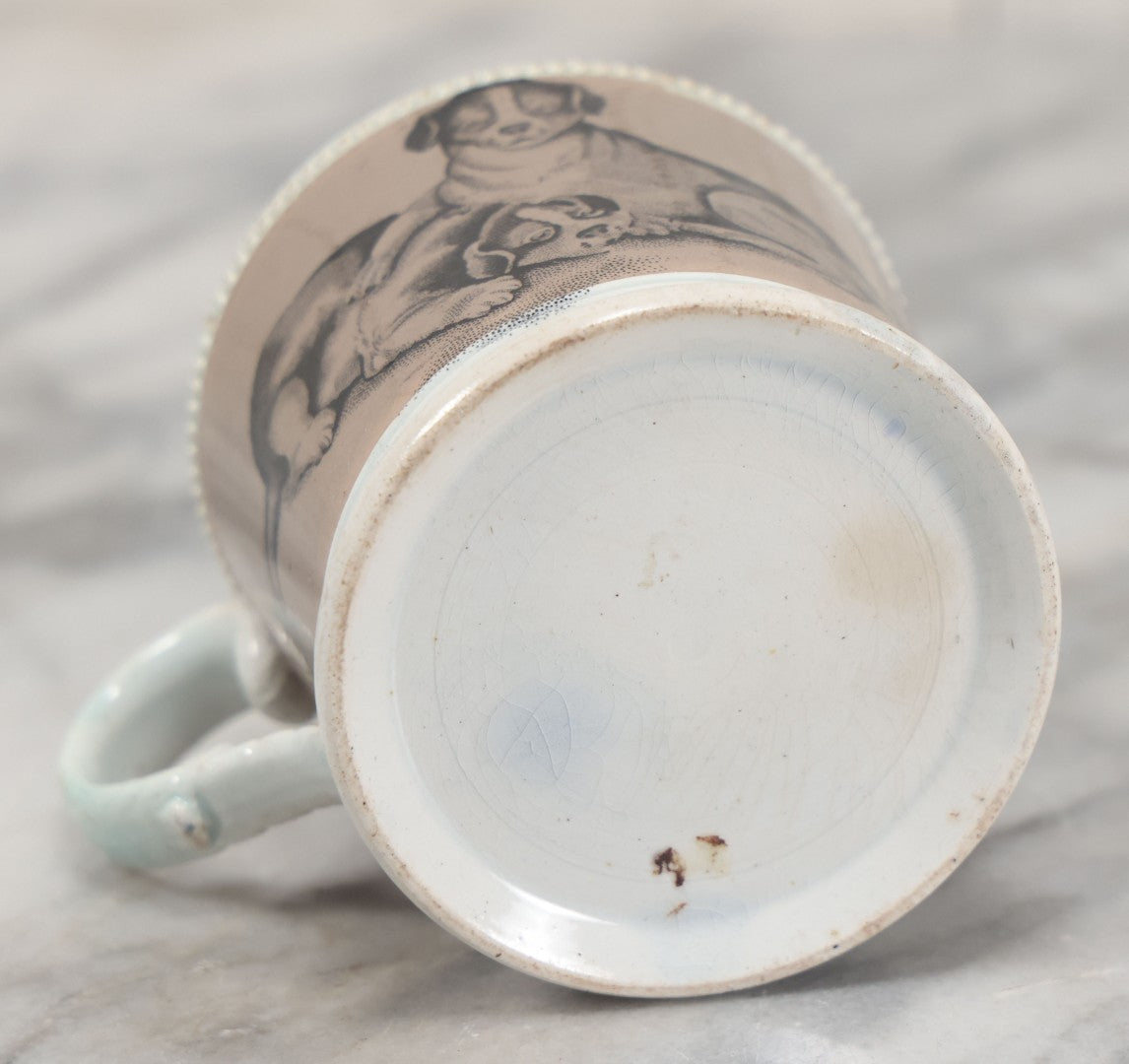 Lot 059 - Antique Transferware Ceramic Mug With Cats And Dogs, Geometric Pattern On Interior
