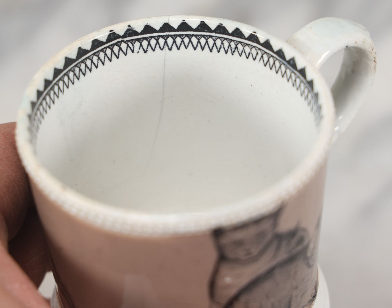 Lot 059 - Antique Transferware Ceramic Mug With Cats And Dogs, Geometric Pattern On Interior