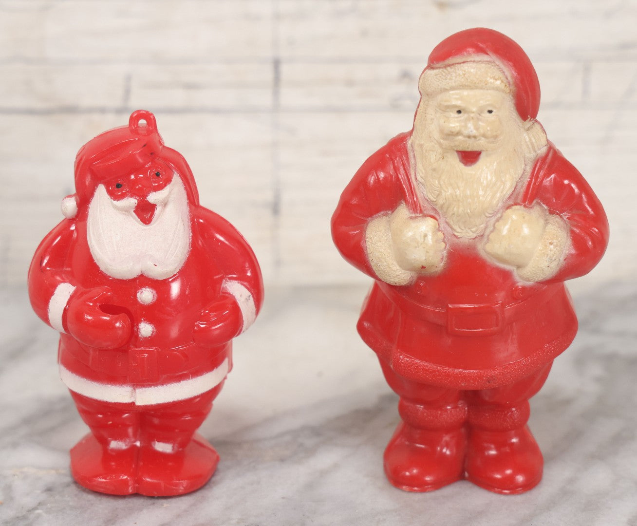 Lot 066 - Pair Of Vintage Hard Plastic Santa Claus Christmas Candy Lollipop Containers, One Marked Irwin, U.S.A.