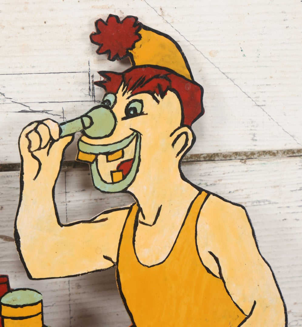 Lot 067 - Vintage Folk Art, Scroll Cut Hand Painted Clown With Large Feet Doing Makeup In Mirror, Grinning With Yellow Teeth 