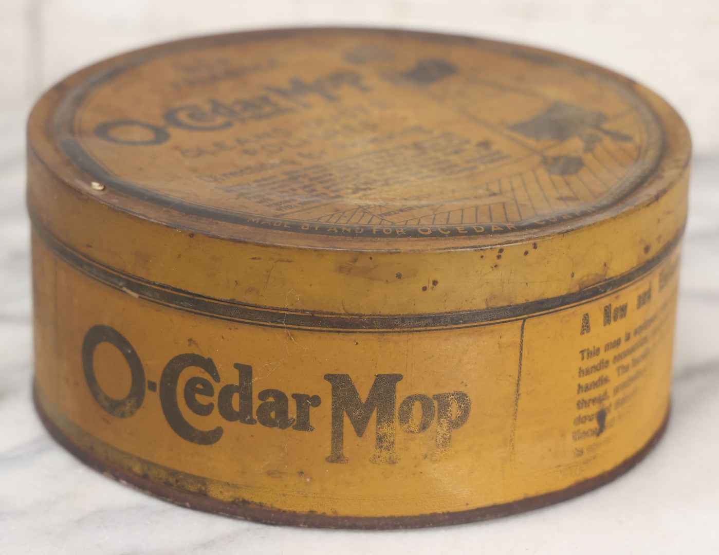 Lot 071 - Antique No. 4 Triangle O-Cedar Mop Polish Tin, Copyrighted 1923, Made By And For O-Cedar Corporation, Chicago, Toronto, London, Paris, Made In U.S.A.