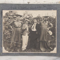 Lot 104 - Antique Snapshot Photo On Album Paper Of Two Couples Cross Dressing, Men In Dresses, Women Smoking Cigars, Identified